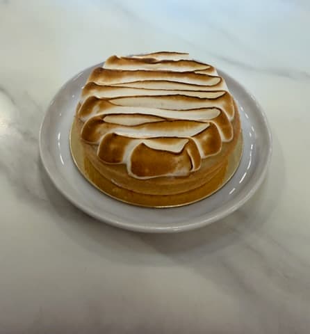 Lemon meringue tart with torched Italian meringue