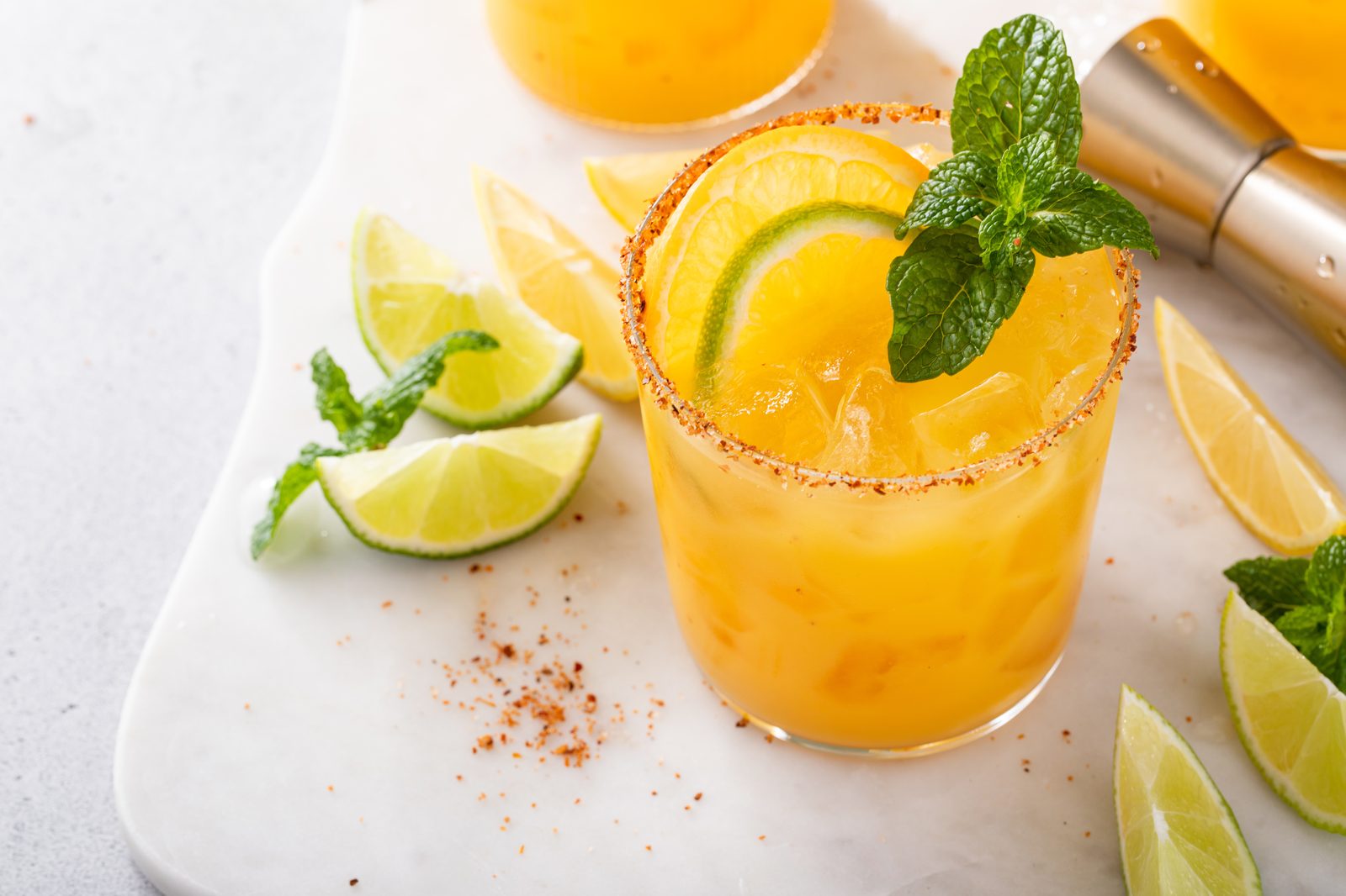 Citrus Solstice Gimlet with a delicate citrus garnish